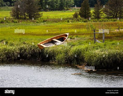 Docked Vintage Rowboat On A Lake Bank Stowe Vermont New England Row