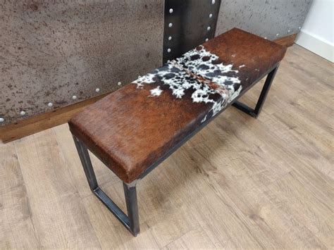 Would look great at the end of the bed. bespoke Cowhide topped bench / ottoman | Steel bench ...