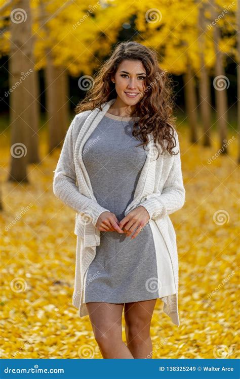Brunette Model Enjoying A Fall Day In Fall Foliage Stock Image Image