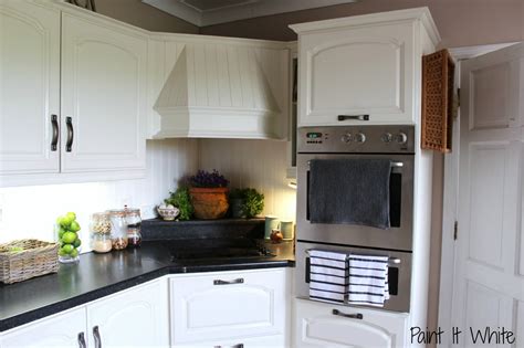 And white chalk paint tends to make a kitchen look light and airy. Remodelaholic | Beautiful White Kitchen Update (with chalk ...