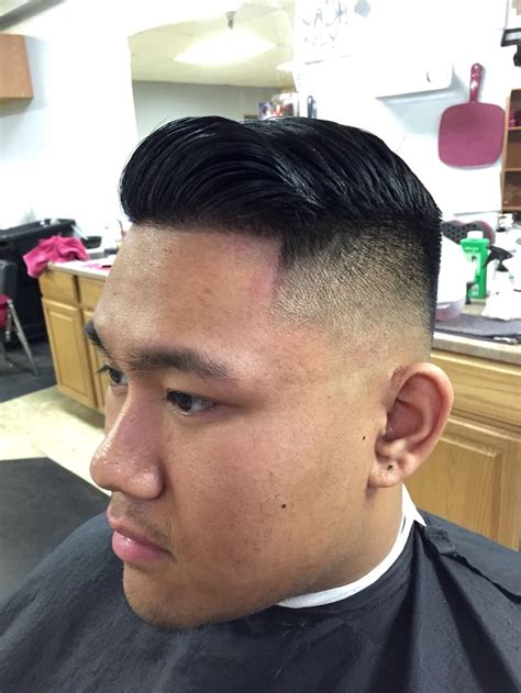 @anthonybarber gets the high and tight right with this razored combover and dramatic fade, paying close attention to the sides and corners of the forehead. Bald fade combover with a hard part by Shaii at Unique ...