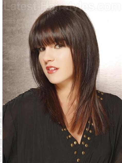 Short fringe covering half of your the forehead is hidden with straight fringes while the hair touching the shoulder is curled. Medium length hairstyles with fringe