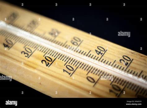 Picture Of A Thermometer Used To Measure Room Temperature A Wooden