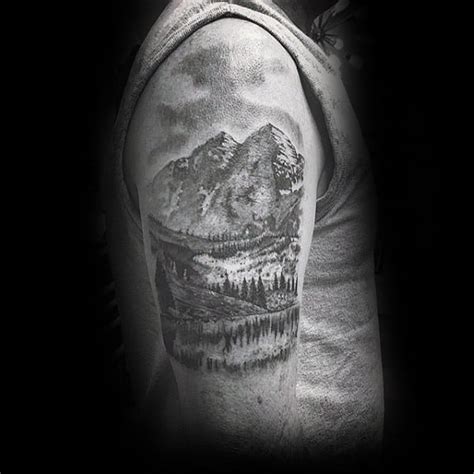 If you're looking to get a really big nature piece, a landscape back tattoo may be a great choice. 90 Landscape Tattoos For Men - Scenic Design Ideas
