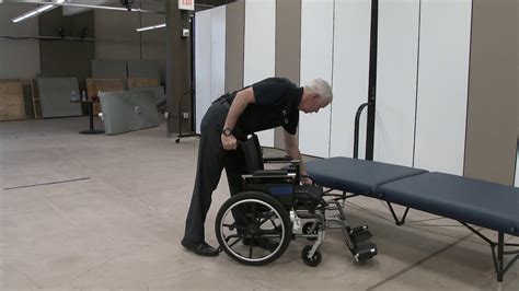 Caregiver Moves Wheelchair After Transfer Youtube