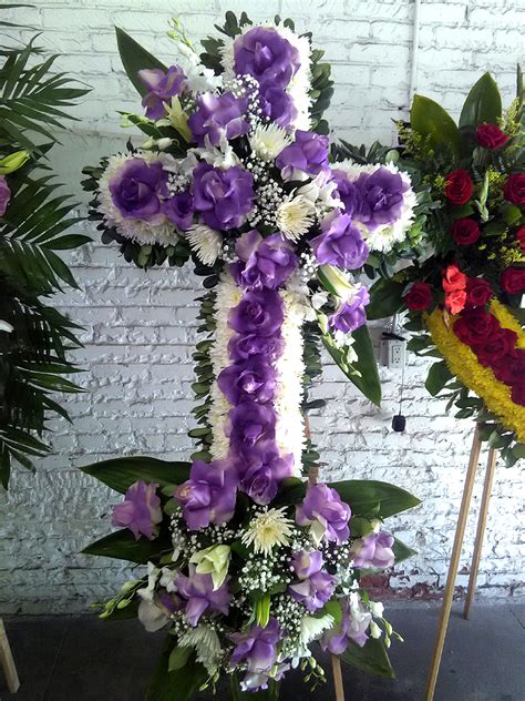 Maybe you would like to learn more about one of these? WHITE AND PURPLE CROSS FLOOR BASKET - Flower Delivery ...
