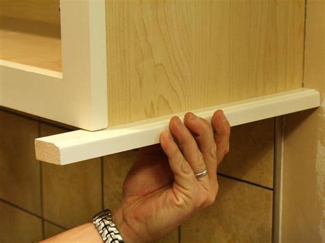 That said, position the cabinets on the floor directly lining up with their point of installation. How to Install a Kitchen Cabinet Light Rail | how-tos | DIY