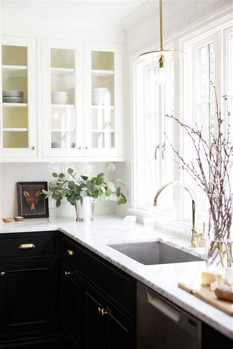 Beautiful antique style kitchen cabinets of wooden materials finished in white and creams. 10 Tricks to Make a Small Kitchen Look Bigger | AO Life | Live