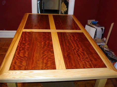 A dining room remains a desirable home feature, whether it is a distinct room or integrated into an open plan. Dining table - wood inlay | Wooden dining tables, Dining ...