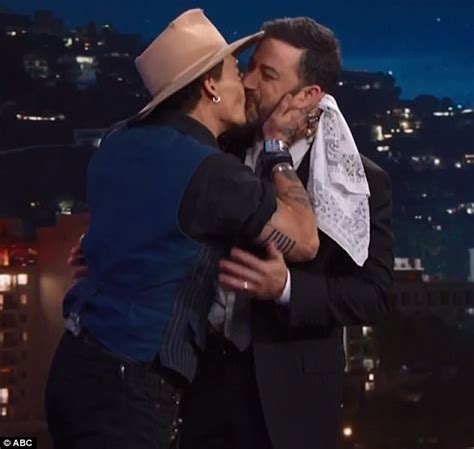 Johnny Depp Greets Jimmy Kimmel With Big Kiss On The Lips Daily Mail