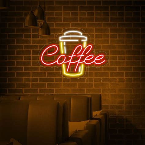 A Neon Sign That Says Coffee On The Wall