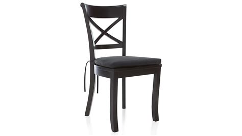The most common black wood chair material is wood. Vintner Black Wood Dining Chair and Cushion | Crate and Barrel