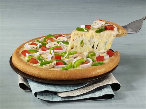 The topping and the spread used in this recipe is very similar to any other pizza, but is filled with molten cheese in it. Dominos Pizza Crusts - Dominos India