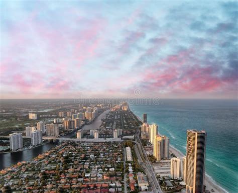 Aerial View Of Miami Beach At Sunset From Helicopter City Skyline And