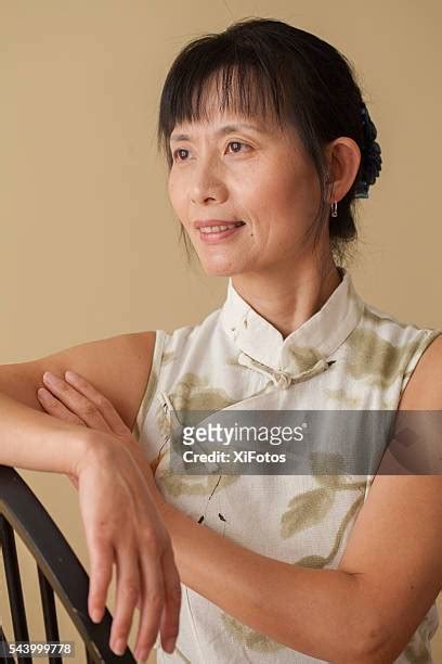 Mature Asian Women Fotos Photos And Premium High Res Pictures Getty