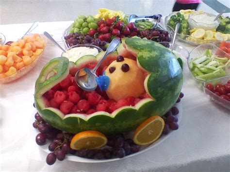 15 fun baby shower fruit display ideas. Carriage fruit bowl with baby (With images) | Fruit, Fruit ...