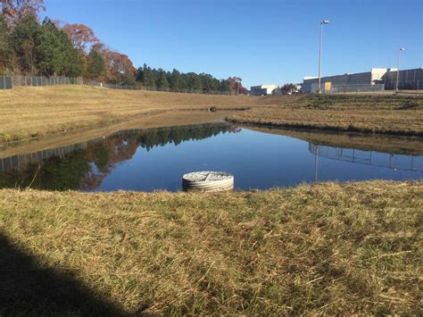 Detention ponds are more common in the arid west and serve as important flood control features. Fayetteville, NC Wet Detention Basin Restoration | AQUALIS