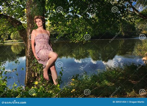 Beautiful Young Woman Standing By The River Stock Photo Image Of