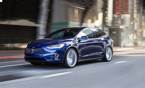 Tesla model x | key fob features and how to operate. 2016 Tesla Model X Pictures | Photo Gallery | Car and Driver