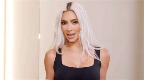 Kim Kardashian Shows Off Chiseled Abs In Just A Naked Bra Promoting