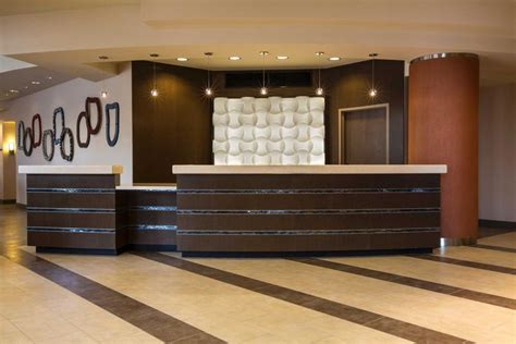 Modern Front Desk With A Helpful And Friendly Staff Cambria Hotel And