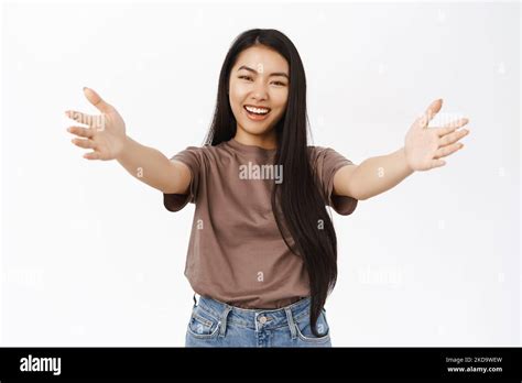 Beautiful Asian Woman Extending Hand Spread Arms For Hug Welcoming