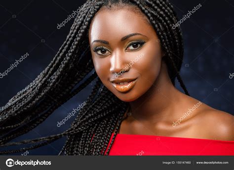 portrait de jeune fille africaine avec des tresses image libre de droit par karelnoppe