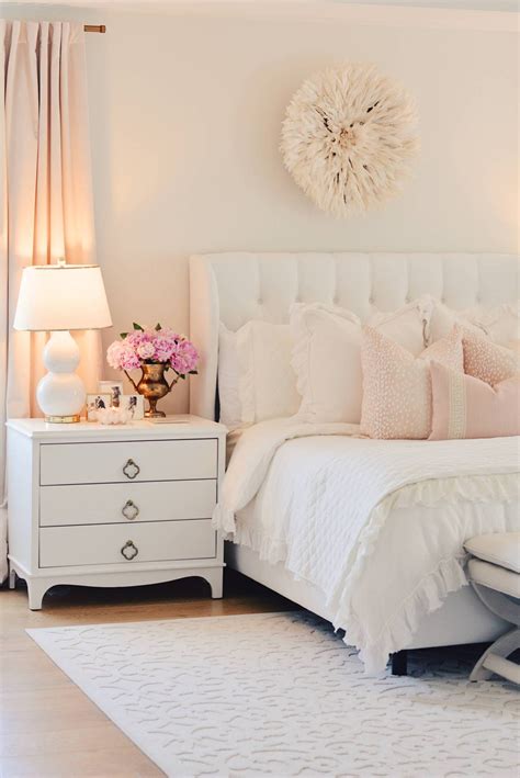 Elegant White Master Bedroom And Blush Decorative Pillows