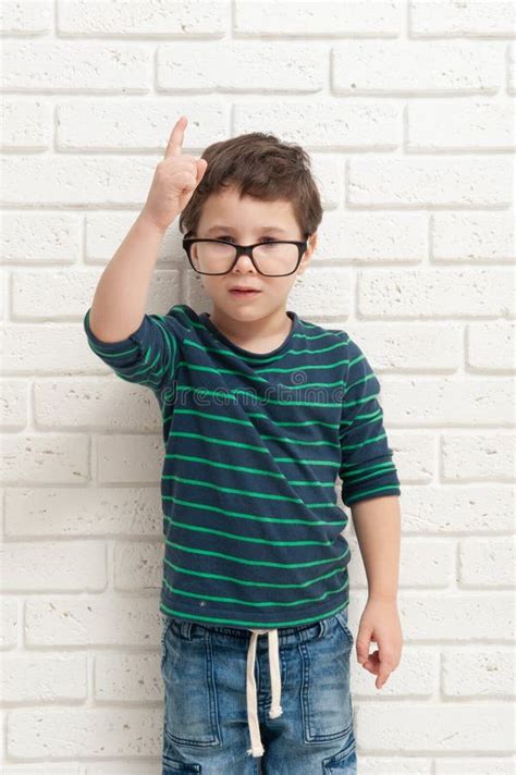 Little Boy In Glasses Raised His Index Finger Up Idea Came To Mind