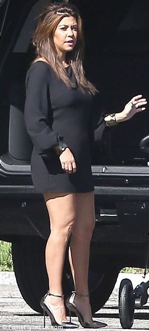 Kourtney Kardashian Shows Off Her Legs In Flattering Black Mini Dress
