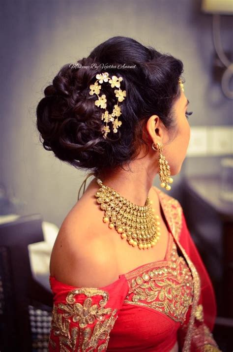 Soft waves are the perfect bridal hairstyle for a bride with style and attitude! Indian bride's reception hairstyle by Vejetha for Swank ...