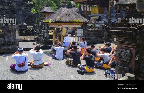 People Praying In Pura Tirta Empul Hindu Temple Bali Indonesia Stock Video Footage Alamy