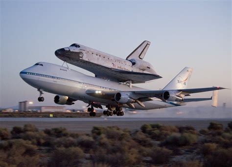 Space Shuttle Discovery And Its Modified 747 Carrier Aircraft Lift Off