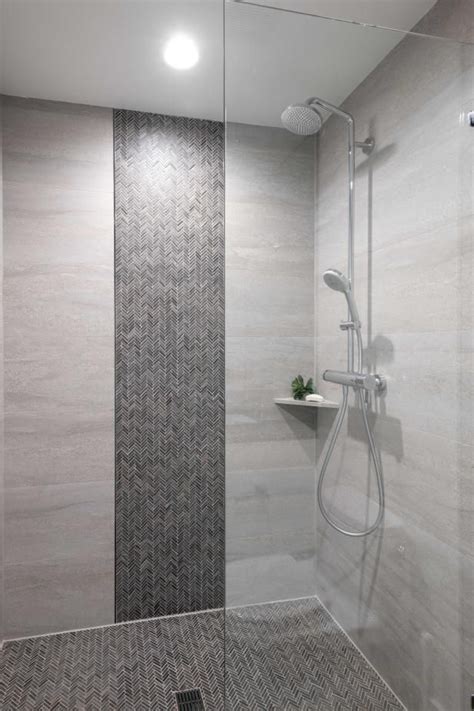 Check Out This Sleek Walk In Shower With A Herringbone Mosaic Tile Floor On Modern