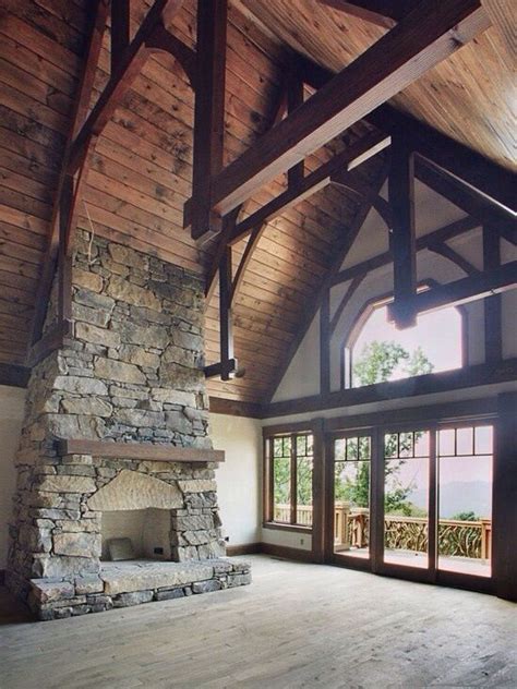 stone fireplace  cathedral ceilings rustic house rustic