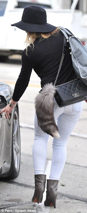 She S Up Fur It A Smiling Hilary Duff Shows Off Her Tail On A Trip To