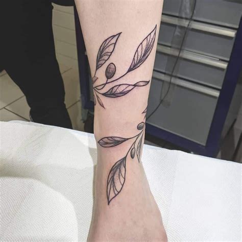 The Olive Branch Tattoo On The Wrist Olive Tree Tattoos Olive Tattoo
