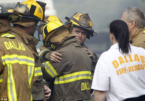 The Moment A Firefighters Remains Emerge From Charred Rubble As A Line