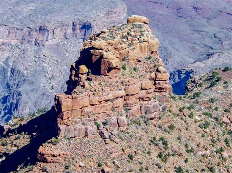 Monumental Battleship Rock Formation Rises High From Grand Canyon Az