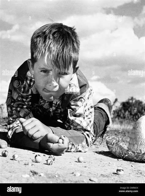 Boy Playing With Marbles Black And White Stock Photos And Images Alamy