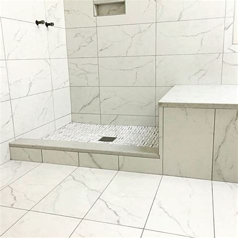 That marble is simply to die for. Ceramic and Porcelain Tile Cost and Installation price | Marble showers, Porcelain tile, Tiles
