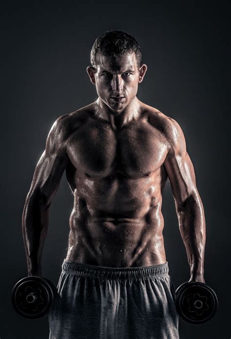 Muscular Male Fitness Trainer Portrait Muscular Male Posing With