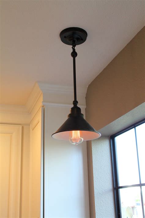 Kitchen In Capitola Oil Rubbed Bronze Light Fixture With An Old