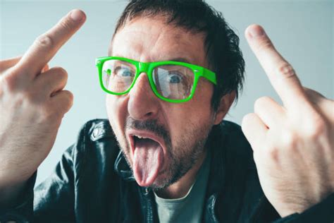 Giving Middle Finger 스톡 사진 및 일러스트 Istock