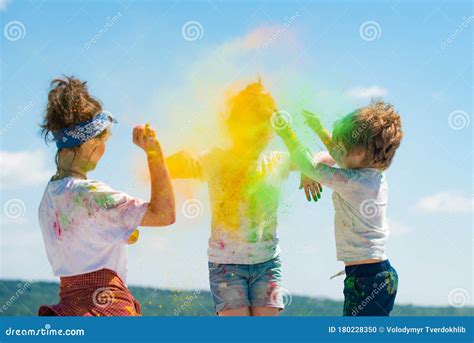 Kids Playing With Colours Children Celebrating Holi Festival Of