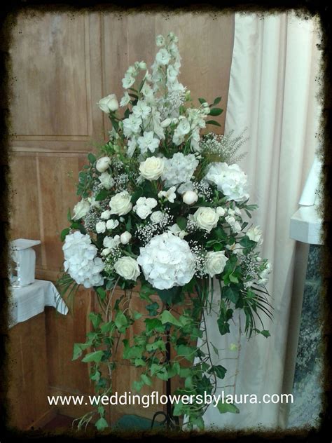 White Pedestal Arrangement With Roses Hydrangeas Hydrangea Ivy And