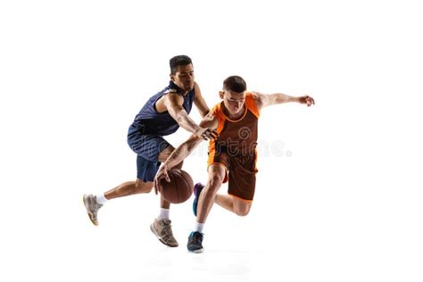 Portrait Of Two Basketball Players In Motion Training Playing