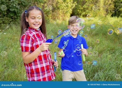 Kids Playing With Bubbles Stock Image Image Of Childhood 105187965