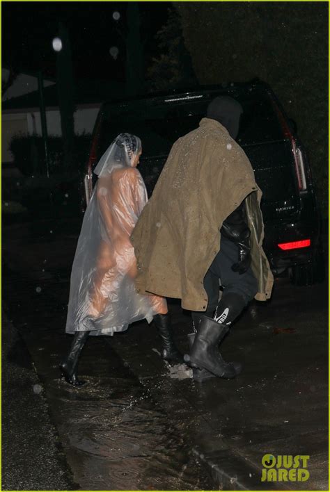 kanye west s wife bianca censori braves the rain in see through poncho with nothing underneath