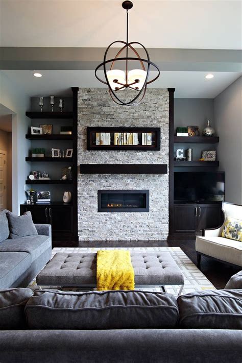 Dark Hardwood Floor Grey Sofa Modern Pendant Light Brick Fire Place